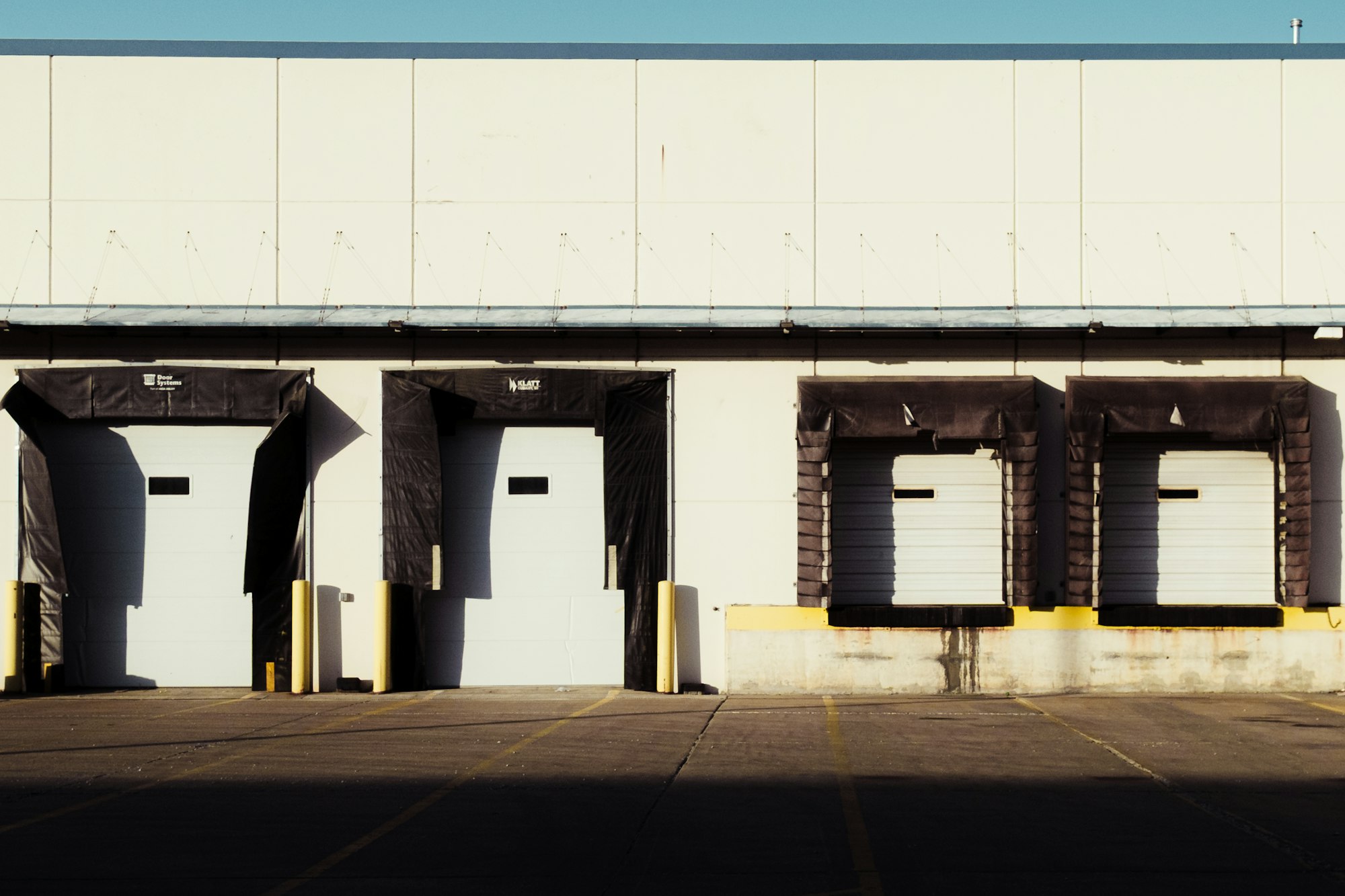 Loading dock doors at a distribution center Loading dock doors at a distribution center